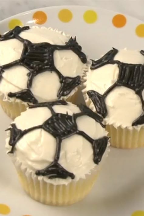 How to Decorate Soccer Cupcakes | "You can turn any cupcakes into little soccer balls. Perfect for watching the World Cup or to bring to your kid's soccer game as a treat." #cupcakerecipes #bakingrecipes #dessertrecipes #cupcakeideas Soccer Cupcakes, Soccer Snacks, Soccer Birthday Parties, Fun Decorations, Soccer Birthday, Blue Food Coloring, Allrecipes Recipes, Soccer Party, Soccer Game