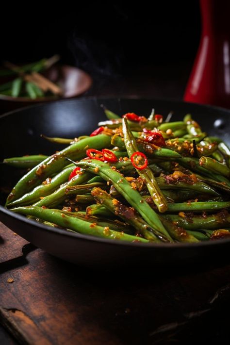 A traditional wok filled with Stir-Fried Green Beans, showcasing their vibrant green hue and glistening with a light soy sauce coating, atop a stove. Fry Green Beans, Spicy Green Bean Recipes, Stir Fry Green Beans, Honey Fried Chicken, Stir Fry Greens, Green Bean Dishes, Spicy Green Beans, Fried Green Beans, Vegetable Side Dishes Recipes