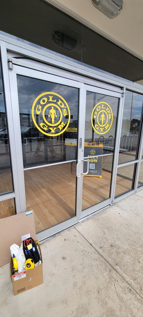 Your fitness journey begins the moment you walk through the door. Take inspiration from Gold's Gym and make a strong entrance! #advertisingsigns #storesigns #houstonsigncompany #businesssigncompany #windowgraphics #customwindowgraphics #goldgym #friendswoodtx #friendswoodgraphics #friendswoodsigns #custombranding #branding Brand Your Business, Gold's Gym, Storefront Signs, Commercial Signs, Window Graphics, Sign Company, Golds Gym, Tell A Story, Branding Your Business