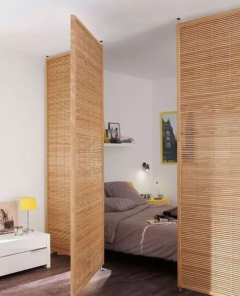 Do you like whimsical details in your small studio apartment? This blog post has 23 great ideas from fluted glass partitions, foldable room dividers to create privacy in your bathroom and more! From funky to functional—- you’re sure to find a room divider idea you’ll love. Reka Bentuk Bilik Tidur, Beautiful Bed Designs, Design Ložnic, Studio Apartment Divider, Hiasan Bilik Tidur, Deco Studio, Vintage Room Decor, Room Ideas Aesthetic, Apartment Layout