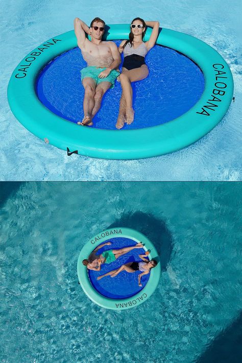 This giant inflatable water hammock spans 8 feet in diameter, has an adjustable elastic mesh center, and doubles as an island, sunbathing platform, and more. Water Hammock, Floating Water, Giant Inflatable, Beach Swim, Floating In Water, Hammock, Float, Floating, Swimming