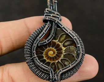 Wire wrapped swarovski crystal pendant - Etsy Wire Weaving Techniques, Ammonite Jewelry, Moon Necklace Silver, Copper Gifts, Unique Pendant Necklace, Fossil Jewelry, Ammonite Fossil, Electroformed Jewelry, Handmade Bangles