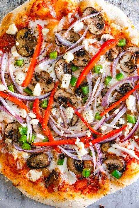 This veggie supreme pizza is supremely delicious! It's fully loaded with savory mushrooms, green pepper, red onion, feta cheese and oregano. #pizza #supreme #homemade #pizzadough #pizzasauce #homemadepizza #mealprep Salad Supreme Recipe, Green Pepper Pizza, Supreme Pizza Recipe, Pizza Supreme, Onion Pizza, Clean Eating Salads, Pizza Salad, Supreme Pizza, Best Homemade Pizza