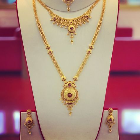 RathyJewellers New Branch. on Instagram: “Full Bridal set with Ruby gem stones. Long Patta set, Necklace, Earrings and Tikka. Complete set for the big day. Rathy Jewellers New…” New Gold Jewellery Designs, Gold Earrings Models, Gold Jewelry Simple Necklace, Gold Mangalsutra Designs, Gold Necklace Indian Bridal Jewelry, Gold Necklace Simple, Gold Necklace Indian, Gold Bridal Jewellery Sets, Gold Jewelry Stores