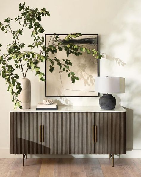 Arhaus on Instagram: "Eclectic looks are in! ✨Reeded oak meets white marble for a truly unique look. Our Finnley Collection pieces are a perfect example of a mixed-material design that fits with any style!" Living Room Comode, Entry Way Credenza Decor, Minimalist Sideboard Decor, Wall Above Sideboard, Entrance Credenza, Entry Credenza, Entrance Sideboard, Minimalist Credenza, Eclectic Entry