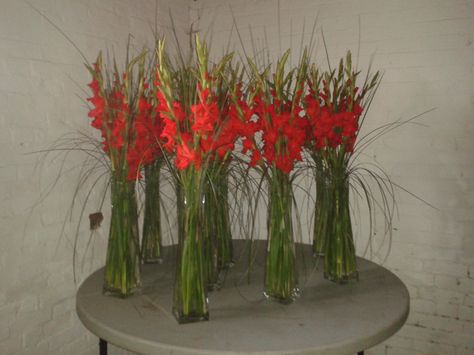 Red gladioli centrepieces. Gladiolus Wedding Bouquet, Gladiolus Wedding Flowers, Gladiolus Centerpiece, Gladiolus Wedding, Gladiolus Arrangements, Gladiolus Flower Tattoos, Gladiolus Flower, Gladioli, Church Flower Arrangements