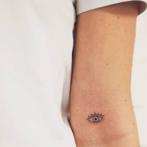 Bicep Tattoo Women Minimalist, Eye Finger Tattoos For Women, Evil Eye Tattoo On Arm, Evil Eye Micro Tattoo, Evil Eye Linework, Evil Eye Shoulder Tattoo, See No Evil Eye Tattoo, Eye Love You Tattoo, Evil Eye Tattoo Minimalist