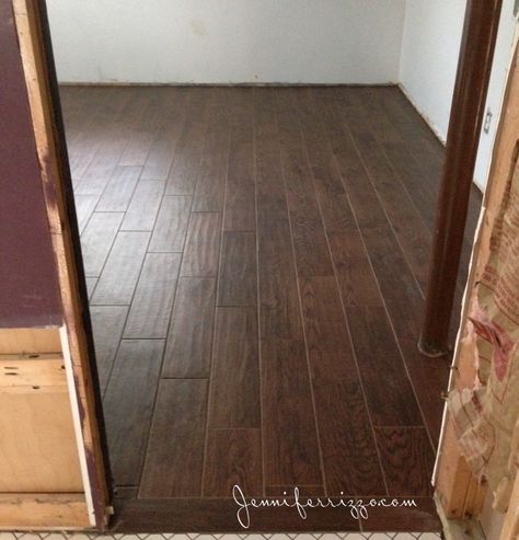 Wood look cermic tile on a basement floor,looks like real wood Bathrooms With Wood Floors, Wood Look Ceramic Tile, Ceramic Wood Tile Floor, Wood Tile Floor, Wood Look Tile Floor, Wood Tile Bathroom, Downstairs Bedroom, Porcelain Wood Tile, Tile Floor Living Room