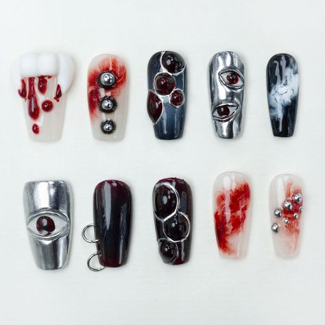 Get ready to haunt in style with our Halloween Collection! 🎃👻 From eerie cat eye gels to spooky claws, these designs are perfect for your ultimate Halloween look. Shop now and slay the season -- #donailsar #pressonnails #halloweennails #cateyegel #pressons #nails Spooky Nail Designs Ideas For Halloween, Eye Ball Nails, Scary Nail Designs, Creepy Nail Art, Spooky Nails Halloween, Creepy Halloween Nails, Eye Nail Design, Scary Nail Art, Pressons Nails