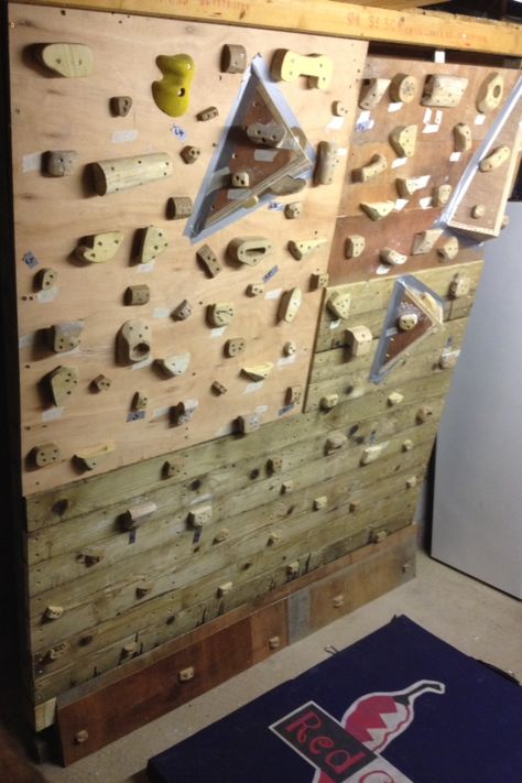 My homemade bouldering wall in my garage with wooden climbing holds that I made myself Diy Climbing Holds, Wooden Climbing Holds, Rock Wall Ideas, Diy Rock Wall, Climbing Wall Design, Climbing Hall, Wall Panel Texture, Diy Climbing Wall, Rock Climbing Training