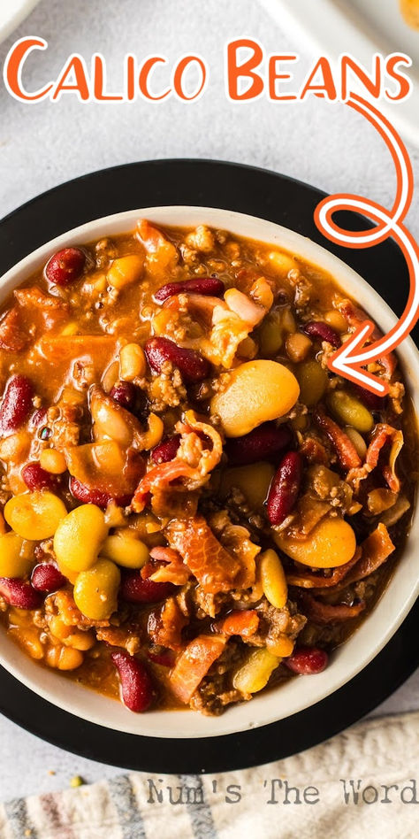 Have you ever dived into a bowl of Crock Pot Calico Beans and found yourself in comfort food heaven? Well, that’s exactly what you’re going to eat! #numstheword #crockpotcalicobeans #calicobeans #calicobeansrecipe #calicobeanrecipe #calicobean #calicobeandish #calicobeanscrockpot #calicobeansslowcooker #crockpotcalicobeans #calicobeansrecipecrockpot #calicobeansincrockpot #calicobeansrecipecrockpot #calicobeansslowcooker #slowcookercalicobeans #calicobeansinslowcooker Calico Beans With Hamburger And Bacon, Calico Beans Crockpot, Calico Bean Soup Recipe, Crockpot Calico Beans, Slow Cooker Calico Beans, Beans Dishes, Calico Beans Recipe, Legume Recipes, Calico Beans