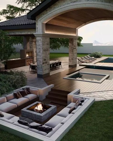 Picture of a gorgeous contemporary sunken patio with built in benches and a fire pit in the center, with taupe pillows welcomes in House With A View, Sunken Patio, Private House, Small Backyard Design, Dream Backyard, Outdoor Kitchen Design, Dream House Exterior, Backyard Patio Designs, Backyard Oasis