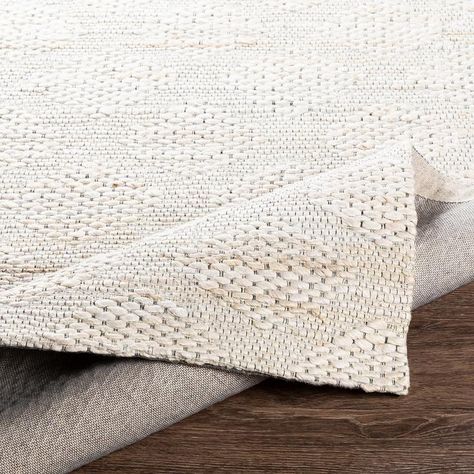 The simplistic yet compelling rugs from the Surya Trace area rug collection effortlessly serve as the exemplar representation of modern decor. The meticulously woven construction of these pieces boasts durability and will provide natural charm into your decor space. Color: Ivory Material: 100% Jute Hand Woven, Low Pile Surya Rug, Surya Rugs, Artisan Rugs, Natural Fiber Rugs, Area Rug Collections, Ivory Area Rug, Black Camel, Ivory Rug, Jute Rug