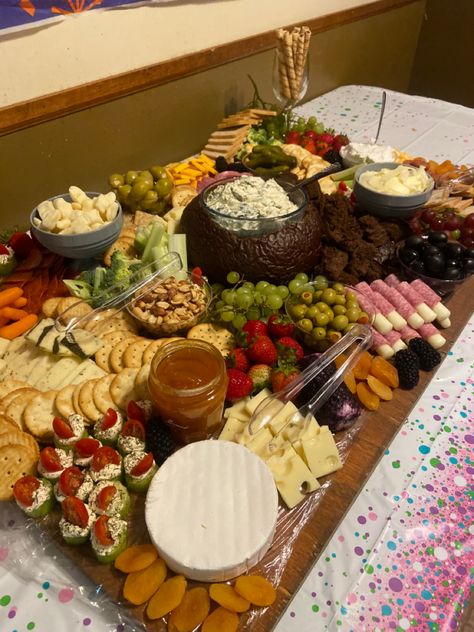 I created this Charcuterie board for my sister’s surprise birthday party. It includes many meats, cheeses, brie, goat cheese, cucumber bites, olives, spinach dip, fruit, crackers, preserves & nuts. #charcuterie #charcuterieboard #cheese #snack   #partyplatter #partyfood Spinach Dip Charcuterie Board, Chips Charcuterie Board, Goat Cheese Cucumber, Charcuterie Board Inspiration, Fruit Crackers, Cheese Snack, Hosting Parties, Food Boards, Cucumber Bites