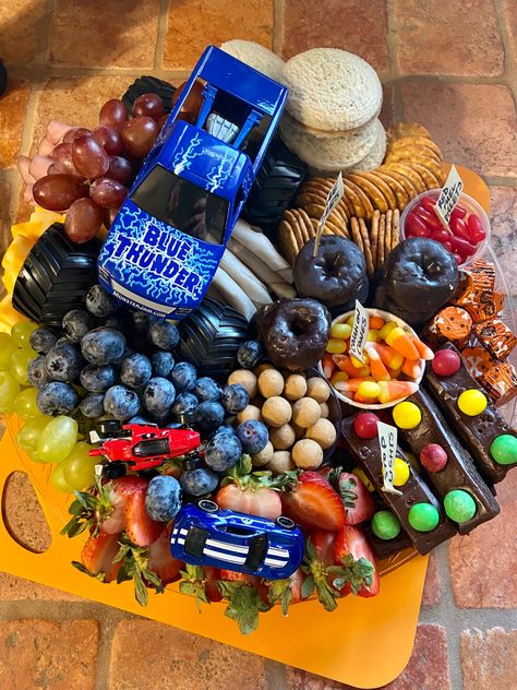 Monster Jam Birthday Food, Monster Truck Fruit Tray, Monster Truck Birthday Snacks, Monster Truck Snack Ideas, Monster Truck Charcuterie Board, Monster Truck Birthday Treats, Monster Truck Snacks, Monster Jam Food Ideas, Monster Truck Birthday Food Ideas