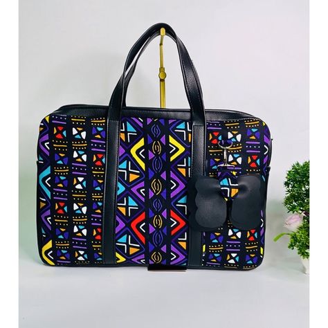 Yes, it's a laptop bag, and yes it's fancy and spiffy. Exactly what you need to give that classic and vibrant work look. Trash that pale-looking laptop bag and get yourself a bag that uplifts your spirit. #ankara #modabellabyfey #ankarafashiondesigner #ankarabags #bellanaijaweddings #bags #laptoplifestyle #laptopbag Graduation Photo Booth, Ankara Bags, Handmade Fabric Bags, My Style Bags, Bags Diy, Laptop Lifestyle, Graduation Photo, Modern Accessories, Bella Naija Weddings