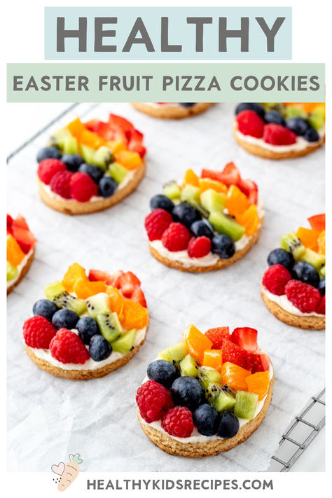 These colorful fruit Easter eggs are the perfect dessert for your Easter meal! Each of the Easter fruit pizza cookies is made with a healthier sugar cookie base naturally sweetened with maple syrup. Then, they’re topped with a delicious cream cheese frosting, and your kid’s favorite fruits arranged to look like Easter eggs. They’re perfect for Easter brunch or a healthier holiday dessert! Easter Egg Fruit Pizza Recipe, Easter Fruit Desserts, Egg Shaped Fruit Pizza, Egg Fruit Pizza, Easter Fruit Pizza, Fruit Easter, Easter Egg Fruit Pizza, Bday Treats, Fruit Pizza Cookies