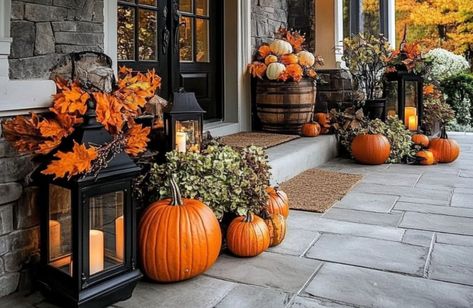 Transform your porch, patio, or any outdoor area into a stunning space with my top fall outdoor decorating ideas and styling tips. I show you how to use seasonal flowers and rich foliage to add color and warmth. Discover creative ways to incorporate lanterns, candles, and string lights to enhance the ambiance. From planters to pathways, every detail is covered to make your space inviting. Be inspired and create a stunning fall space you and your guests will love! RealEstateSpice.com Fall Outdoor Lanterns, Fall Open Lantern Decor Ideas, Pumpkin Lights Porch, Porch Lanterns Decor, Fall Lantern With Fairy Lights, Pumpkin Solar Lights, Fall Lantern Decor, Fall Patio Decor, Fall Patio