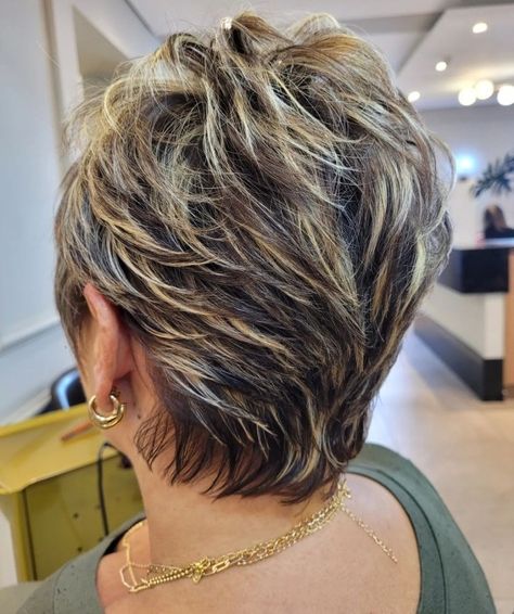 Short Feathered Hairstyle with Blonde Highlights Feathered Hairstyles Short Fine Hair, Feather Short Haircut, Feathered Bob Hairstyles Over 50, Feathered Back Short Hair, Womens Feathered Hairstyles, Feathered Short Hair, Feathered Pixie Haircut, Short Feathered Hairstyles Over 50, Short Feathered Haircuts