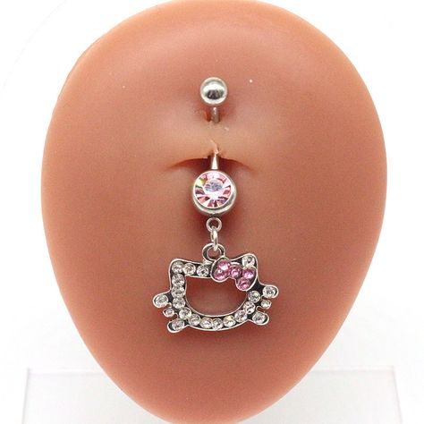 Elevate your belly piercing with our hello kitty belly ring.Material: Stainless Steel 316L Size:14 GA PRODUCT INFOAll our jewelry are made of stainless steel material. For the gold pieces, we added an 18K PVD gold plating. This means the color will last for a really long time (at least a few years). It will not fade easily and it's also an anti-scratch material.Clean your piece before wearing: wash with antibacterial soap and warm water before inserting into your piercing. If the steel jewelry h Belt Button Peircings, Hello Kitty Belly Ring, Belly Ring Jewelry, Belly Button Piercing Hello Kitty, Hello Kitty Belly Button Piercing, Hello Kitty Nose Ring, Stomach Ring, Hello Kitty Belly Piercing, Hello Kitty Nose Piercing