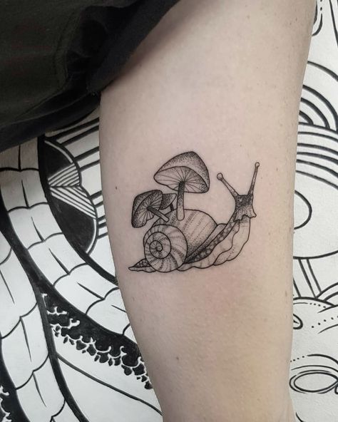 24 Quirky Mushroom Tattoo Designs and Popular Meanings Pumpkin Mushroom Tattoo, Frog On A Mushroom Tattoo, Snail On Mushroom Tattoo, Snail And Mushroom Tattoo, Mushroom Guy Tattoo, Mushroom Person Tattoo, 3 Inch Tattoo Ideas, Tattoo Quirky, Uncommon Tattoos