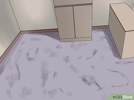 How to Tile a Bathroom Floor (with Pictures) - wikiHow How To Install Ceramic Tile Floor, How To Tile A Floor, Diy Tile Shower Floor, Tiling Bathroom Floor, Diy Tile Shower, How To Tile, How To Lay Tile, Roofing Nails, Shower Units