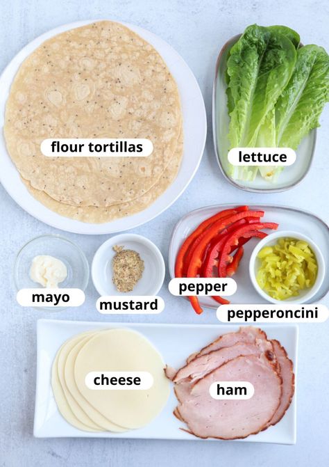 This easy Ham and Cheese Wrap is a super quick and healthy lunch that punches above its weight in terms of effort vs taste experience. Using a variety of textures and colors does the trick! Make it low-carb or gluten-free if you like, with the right kind of tortilla. Ham And Cheese Wraps, Healthier Dinners, Cheese Wraps, Protein Wraps, Ham Wraps, Wraps Recipes Healthy, Nutritious Lunch, 20g Of Protein, Tortilla Wrap