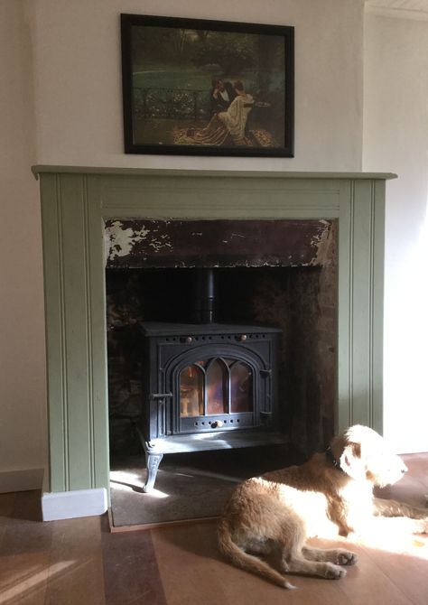 Painted green fireplace with logburner Painted Antique Fireplace Mantel, Painted Wooden Fireplace, Green Mantel Fireplace, Green Wall White Fireplace, Green Fireplace Surround, Olive Green Fireplace, Green Painted Fireplace, Olive Fireplace, Wood Stove In Fireplace