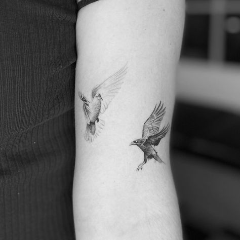 Dove and raven tattooed on the left arm by Oscar Jesus Dove And Raven, Kite Tattoo, Related Tattoos, Artsy Tattoos, Hawk Tattoo, Crane Tattoo, Cage Tattoos, Sparrow Tattoo, Belly Tattoos