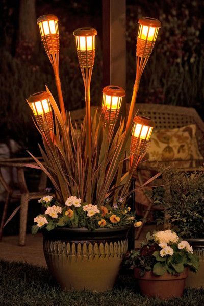 budget friendly backyard patio plans, outdoor living, patio Tiki Torches, Backyard Fun, Backyard Oasis, Lawn And Garden, Outdoor Projects, Garden And Yard, Solar Lights, Garden Planters, Yard Decor