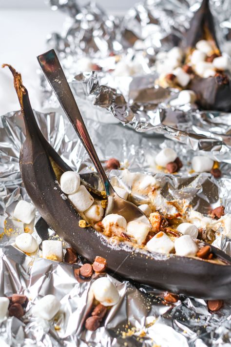 close up of a cooked campfire banana boat S’mores In Oven In Foil, Banana Boats Campfire, Banana Boats Camping, Banana Smores Camping, Grilled Banana Boats, Campfire Banana Boats, Banana Boat Recipe, Campfire Bananas, Hobo Packs