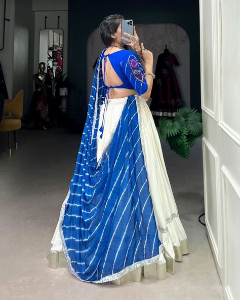 Rate : 1900 #apex__outfit Celebrate the festivities with flair in this plain white Navratri lehenga 🤍💙 Lehenga (Stitched) : Lehenga Fabric : Pure Rayon Lehenga Work : Plain With Embossed Design Gota Lace Border Lehenga Waist : Support Up To 42 Lehenga Closer : Drawstring With Zip Stitching : Stitched With Canvas And Full Inner Length : 41 Flair : 5.5 Meter Inner : Micro Cotton Blouse (Stitched) : Blouse Fabric : Pure Rayon (Fully Stitched) Blouse Work : Plain With Gamthi Patch Work And La... Plain Chaniya Choli, Wedding Wear Pakistani, Choli Navratri, Chaniya Choli Designs, Navratri Lehenga, Long Tunic Dress, White Lehenga, Navratri Festival, Stitched Lehenga