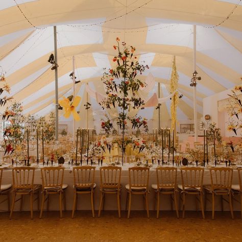 For her surrealist wedding, bride Gaby Novogratz (@supernovo) trusted floralist @emilythompsonflowers with her vision for her receiption. "She transformed delicate wildflowers into bold, larger-than-life structures, perfectly capturing the surreal, Alice Through the Looking Glass–inspired atmosphere of our fairy-tale circus tent," the brides shares. Each guest received a tiny vial of seeds as their seating card, with a simple instruction: “Plant me.” Tap the link in bio for a closer look. Pho... Surrealist Wedding, Circus Tent, Gourmet Desserts, Seating Cards, Cannoli, Through The Looking Glass, Wedding Mood, Orange County, Fairy Tale