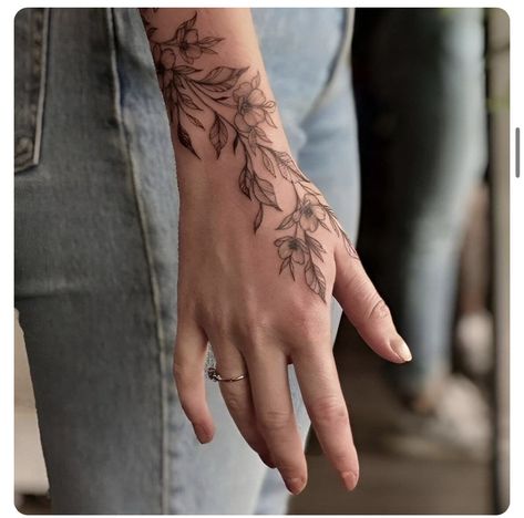 Fern Hand Tattoos For Women, Floral Wrap Arm Tattoo, Wrap Around Wrist Hand Tattoo, Hand Tattoo Plant, Fern Wrap Around Tattoo, Plant Hand Tattoo, Floral Hand Tattoos, Floral Finger Tattoo, Wrist Hand Tattoo