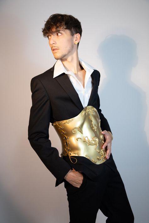 Elevate your male wardrobe with a custom-made, unique waist corset, perfect as an accent piece for special occasion men's fashion. Make a bold statement with a tailored corset designed for stage performances, ensuring you stand out in any outfit. 🖤𝑪𝒖𝒔𝒕𝒐𝒎𝒊𝒛𝒂𝒕𝒊𝒐𝒏 We also offer customization. If you have a special color in mind or want to make small changes to the design, please send us a message to discuss your ideas. 🖤𝑯𝒐𝒘 𝒕𝒐 𝒐𝒓𝒅𝒆𝒓 1. Send your body measurements or just choose your size 2. Select color option 3. Select desired shipping method 4. Ships in 2-5 business days Your corset will closely resemble the photos, but the folds and details may vary, making each piece unique. Thank you for understanding and appreciating the uniqueness of your corset! 🖤𝒀𝒐𝒖 𝒎𝒊? Corset Men Fashion, Male Outfit Design, Mens Wedding Outfit, Corsets On Men, Men In Corset, Burlesque Men, Corset Outfit Men, Guy Corset, Corset Top Men