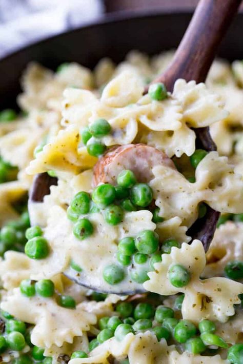 Chicken Sausage and Peas Alfredo Pesto Skillet Pasta Pasta Recipe With Chicken, Skillet Pasta Recipes, Chicken And Peas, Alfredo With Chicken, Pasta And Peas, Easy Pasta Recipes Quick, Bow Tie Pasta Recipe, Chicken Sausage Pasta, Recipe With Chicken