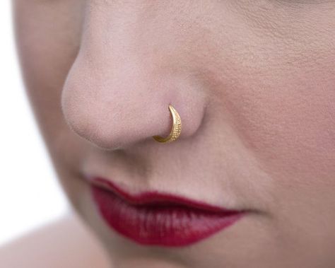 Nose Ring 14K Gold Nose Ring Unique Nose Ring 14K Gold Nose | Etsy Unique Nose Ring, made of 14K Yellow OR Rose Gold, Indian Tribal Style Piercing Jewelry, fits also Daith, Rook, Cartilage, Tragus, Helix, 16g-20g.  Unique feminine nose ring for the stylish individual. Intended to highlight pretty features in your appearance or to add a cool edge to your style #puercings #nosering #alagia Nose Hoop Piercing, Ethnic Nose, Spikes Fashion, Nose Ring Designs, Unique Nose Rings, Piercing Care, Gold Bar Earrings Studs, Hoop Piercing, Gold Nose Hoop