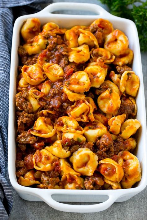 A dish of cheese tortellini tossed in meat sauce. Tortellini With Meat Sauce, Baked Tortellini Recipes, Baked Tortellini, Tortellini Recipe, Recipe With Ground Beef, Dinner Sandwich, Homemade Meat Sauce, Tortellini Bake, Tortellini Recipes