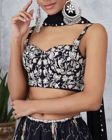 P R I N T S // SERENA SS'19 Our embroidered bustier blouse & printed lehenga define contemporary occasion dressing! --- 🌸Shop at our… Bustier Blouse, Mahima Mahajan, Black One Shoulder Top, Embroidered Bustier, Printed Lehenga, Hand Woven Textiles, Designer Blouse, Black Corset, One Shoulder Tops