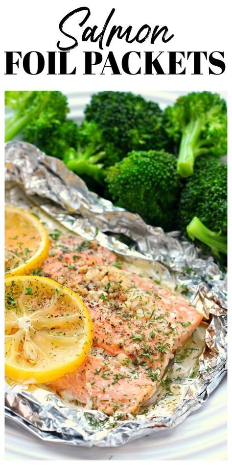 Salmon with lemon in juices sitting on foil. Oven Baked Fish Recipes Foil Packets, Salmon And Broccoli Foil Packets, Tin Foil Salmon Oven, Baked Salmon Foil Packets, Salmon Foil Packets Oven With Broccoli, Salmon Aluminum Foil Recipe, Oven Salmon Recipes Foil Packets, How To Cook Salmon In The Oven In Foil, Foil Packets For The Oven Salmon