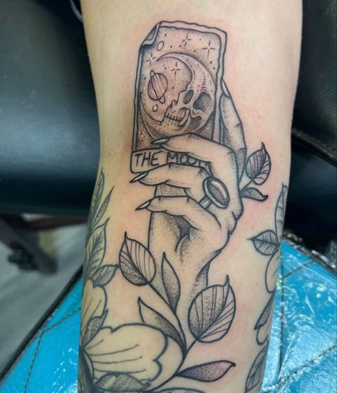 Tattoo with moon tarot card, leaf filler and womans hand with long nails Hand Holding Tarot Card Tattoo, Hand Holding Tarot Card, The Moon Tarot Card Tattoo, Tattoo With Moon, Tarot Card Moon, Fingerprint Heart Tattoos, Earthy Tattoos, Fingerprint Heart, Moon Tarot Card