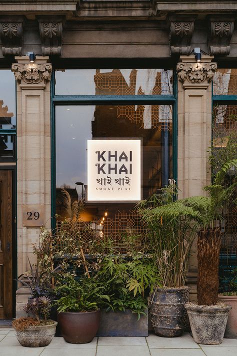 Khai Khai Restaurant Design - Run For The Hills Restaurant Signage Design, Brass Bar Stools, Restaurant Signage, Concave Mirrors, Hot Stones, Steel Lighting, Blackened Steel, Wayfinding Signage, Logo Restaurant