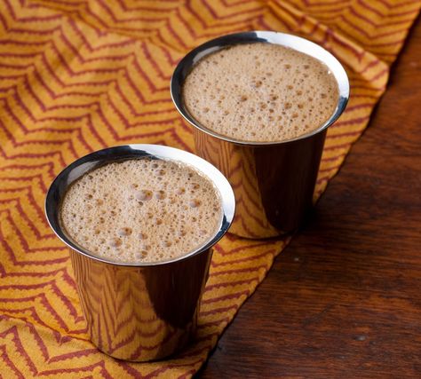 South Indian Filter Coffee Recipe is a favourite Indian beverage that is served along with breakfast. South Indians love this coffee recipe during evenings and they pair it up with a variety of snacks or breads. In most South Indian homes, you can get the waft of freshly brewed coffee in the mornings.The taste of filter coffee depends on the coffee powder used. Some Filter Coffee powder has added chicory which changes the flavour of the extracted filter coffee. The filter coffee is&n South Indian Filter Coffee, Indian Coffee, Almond Milk Recipes, Coffee Bread, Breakfast Photography, Spiced Butter, Chai Recipe, Coconut Chutney, Weekly Meal Plan