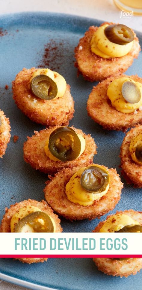 Recipe of the Day: Fried Deviled Eggs 😍 Crunchy and creamy join forces to make an upgraded deviled egg that will upend your usual backyard BBQ fare. Fried hard-boiled egg whites are filled with a tangy egg yolk filling that's packed with pickled jalapeños. It's almost like a Scotch egg meets a deviled egg! Pickeled Eggs, Fried Boiled Eggs Recipe, Fried Jalapenos, Fried Deviled Eggs, Scotch Egg, Hard Boiled Egg Recipes, Pickled Eggs, Fried Pickles, Pickling Jalapenos