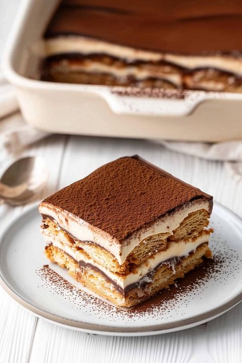 This decadent chocolate tiramisu features cocoa-coffee-soaked ladyfingers layered with silky mascarpone cream and rich chocolate ganache. It's an impressive, irresistible dessert. Gansito Cake, Classic Tiramisu Recipe, Best Tiramisu Recipe, Best Tiramisu, Easy Tiramisu, Easy Tiramisu Recipe, Classic Tiramisu, Tiramisu Cake, Tiramisu Recipe