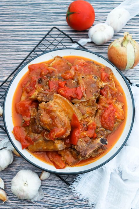 Indulge in the perfect balance of sweet, savoury, and tangy with this easy-to-make pork steak recipe finished in a fresh tomato sauce! 🍅🐖 Tomato Braised Pork Steaks – pan fried and finished in a sweet, savoury, and tangy tomato sauce with garlic and onions. Simple yet delicious! I recently discovered... Pork Tomato Recipe, Pork Ribs In Tomato Sauce, Tomato Braised Beef, Ribs In Tomato Sauce, Oven Braised Beef With Tomatoes And Garlic, Guatemala Recipes, Pork Riblets, Pork Shoulder Steak, Steak Chili