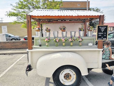 Brooke Waddell is one of the Fayette County Farmers Market cut flower vendors, and the face of “Bellafield Flower Farm.” She notes that her hus Truck Bed Trailer Ideas, Truck Bed Farm Stand, Flower Trailer, Farm Market Ideas, Truck Bed Trailer, Vendor Cart, Farmers Market Stand, Farmers Market Display, Flower Farming