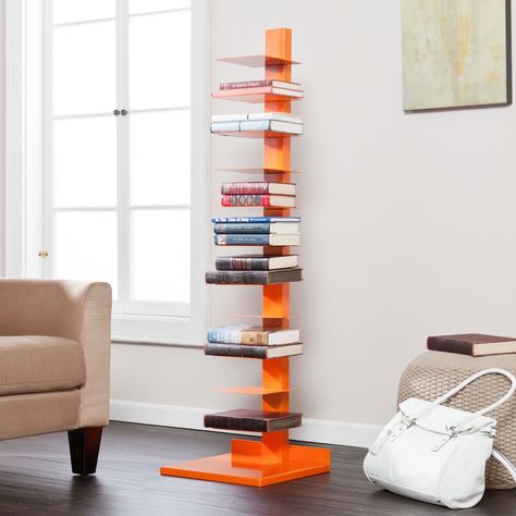 With its eye-catching vertebral form, the Colonne Media Storage adds a fresh and contemporary look to any space. Orange Bookshelves, Sapien Bookcase, At Home Library, Vertical Bookshelf, Spine Book, Media Tower, Book Tower, Shelving Ideas, Bookcase Design