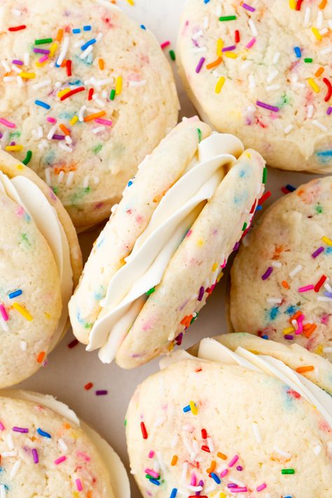 Funfetti whoopie pies are made with soft, cakey vanilla almond funfetti cookies and filled with marshmallow buttercream frosting. Sprinkle Sandwich Cookies, Funfetti Cookie Sandwiches, Funfetti Sandwich Cookies, Cookie Filling Ideas, Funfetti Whoopie Pies, Kid Desserts Easy, Buttercream Cookie Sandwich, Confetti Whoopie Pies, Recipes With Sprinkles