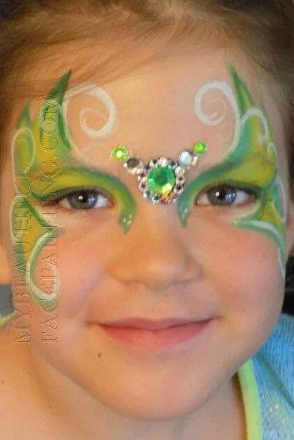 Tinkerbell style green face paint with bling by www.facebook.com/mybeautifulbling. Tiana Face Paint, Tinker Bell Face Paint, Green Face Paint Ideas, Tinkerbell Face Paint, Frog Face Paint, School Spirit Face Paint, Tinkerbell Makeup, Face Painting Unicorn, Green Face Paint